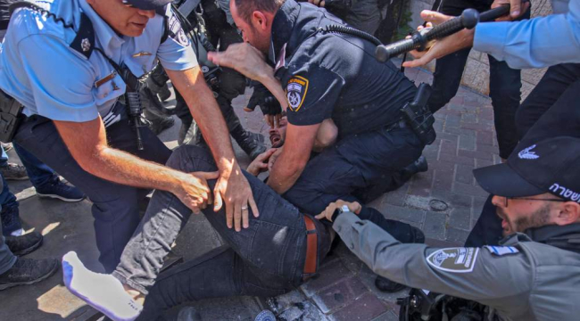 ISRAELI FORCES RUN OVER PALESTINIAN TEEN BIKER IN AL-QUDS FOR CARRYING PALESTINE FLAG